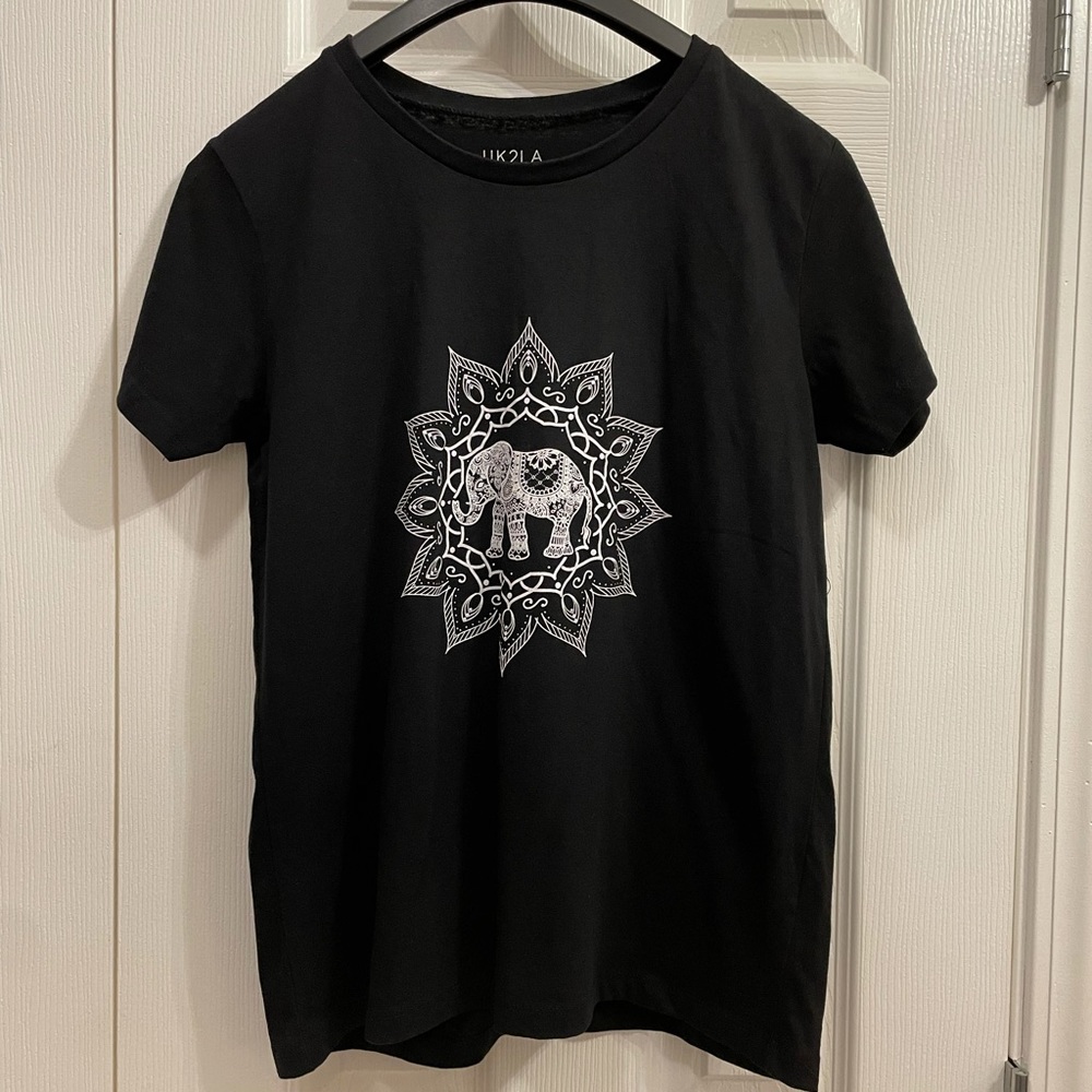 Top with elephant on front